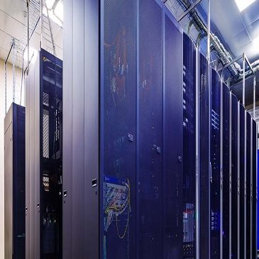room with rows of server hardware in the data center room with rows of server hardware in the data center